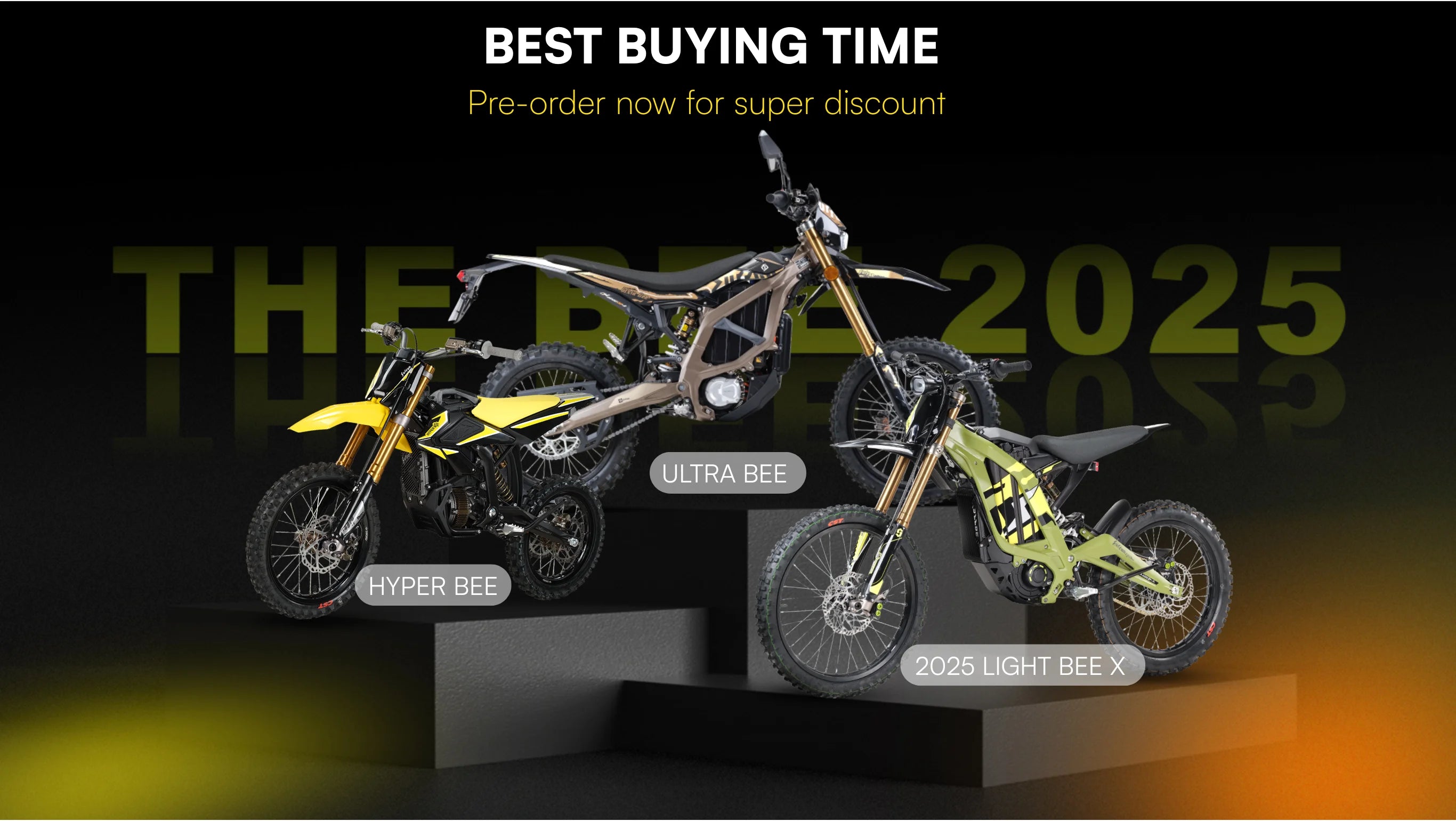 Three dirt bikes displayed on a stand with promotional text about pre-ordering for a discount.