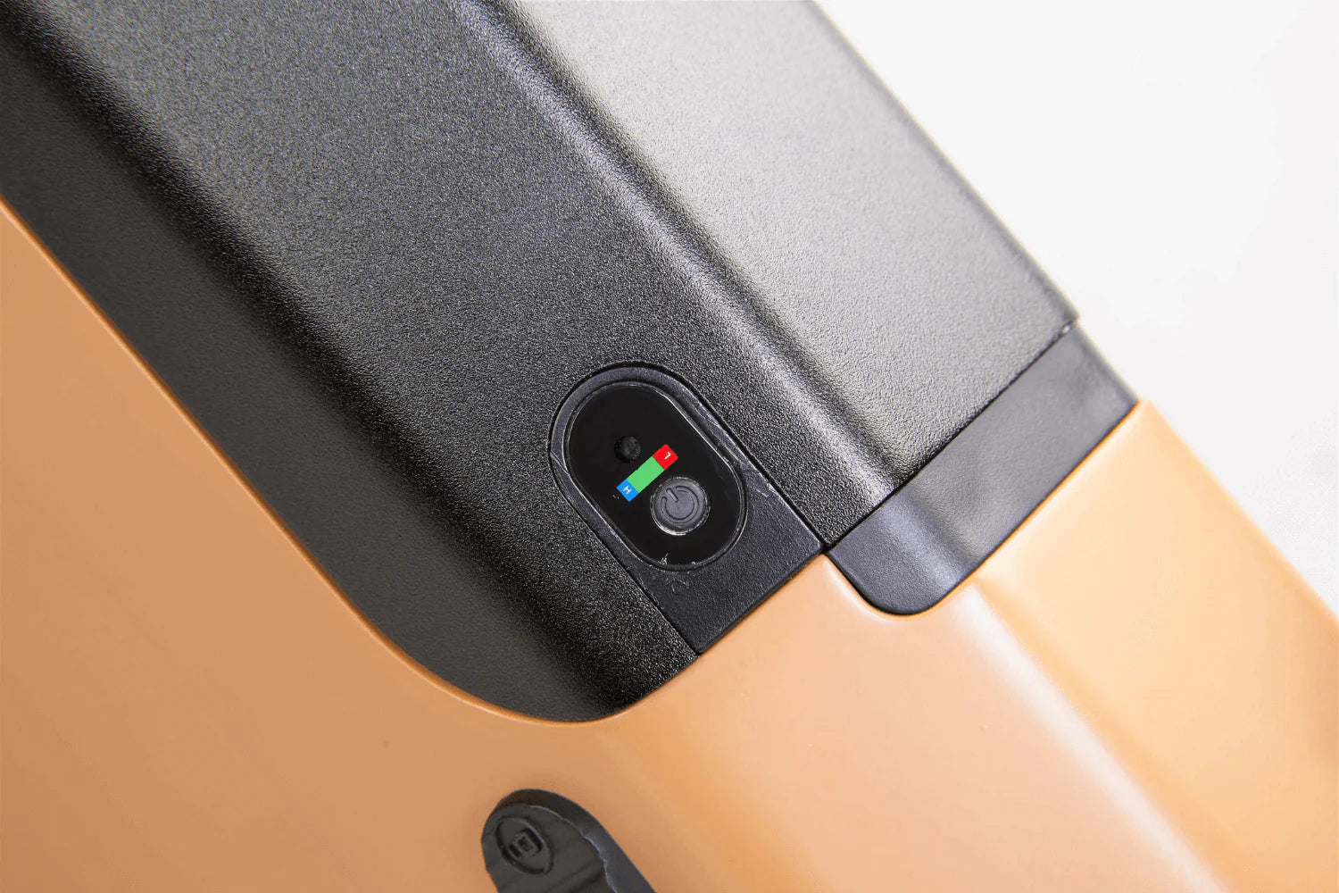 Close-up of a smartphone with a camera lens on a light brown background