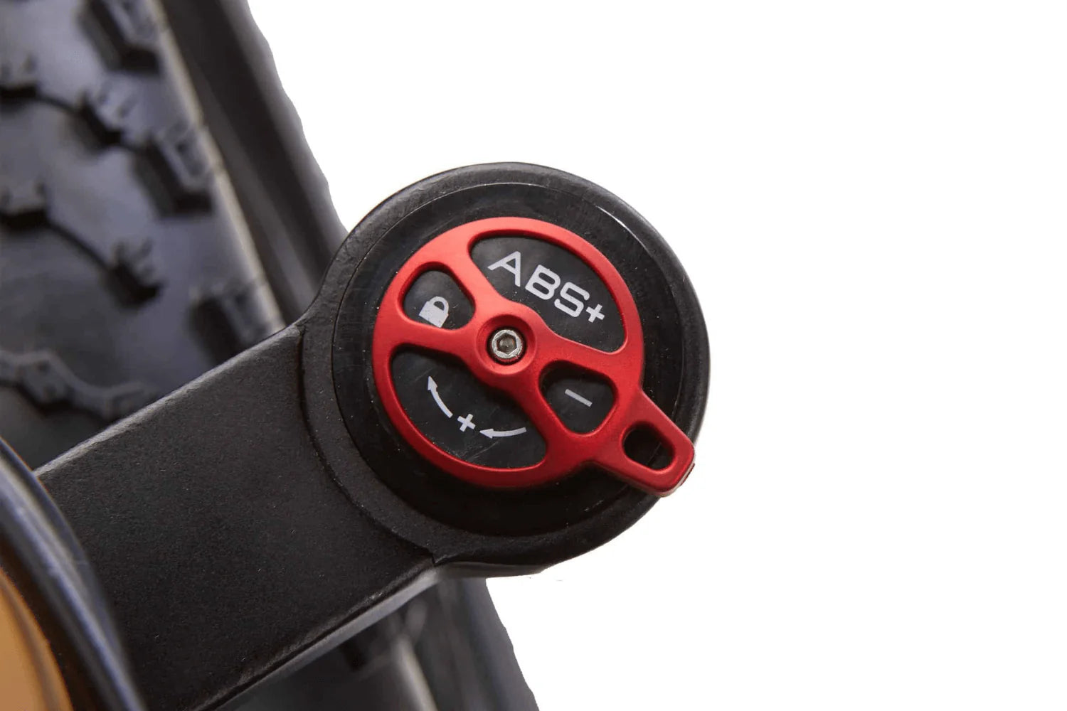 ABS+ brake lever on a bicycle with a blurred tire background