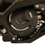 Close-up of a motorcycle engine with 'Sur Ron' branding on a white background