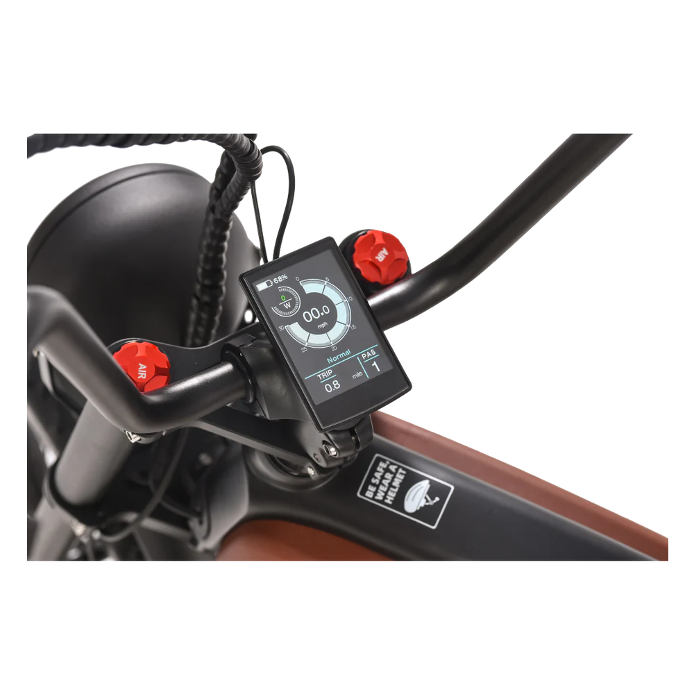 Close-up of a motorcycle handlebar with a digital display and control buttons.