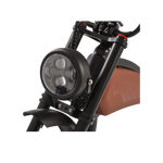 Close-up of a black electric bike with a brown seat on a white background